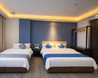 Haoting Business Hotel (Zhaoqing Duanzhou) - Zhaoqing - Habitación