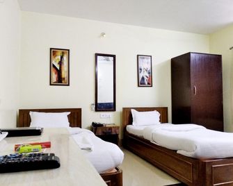 Hotel Pine Yard - Tezpur - Bedroom
