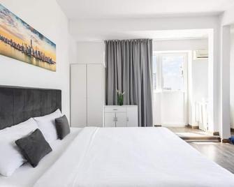 Downtown Victoria Apartments By Citybookings - Bükreş - Yatak Odası