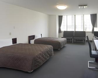 Misawa Highland Hotel - Misawa - Bedroom
