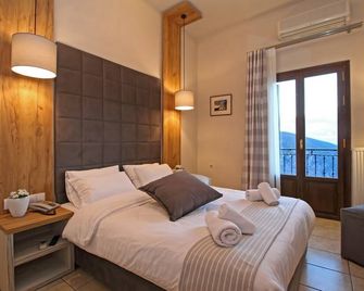 أريون هوتل - دلفي - غرفة نوم