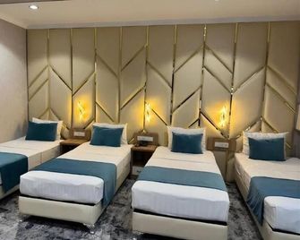 Blue shore international hotel - Taschkent - Schlafzimmer