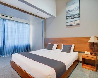 Surya Palace Syariah - Padang - Schlafzimmer