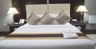 GrandBee Suites - Lagos - Yatak Odası