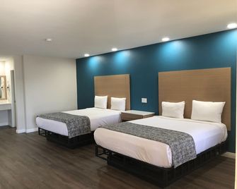 Cali Inn - Carson - Schlafzimmer