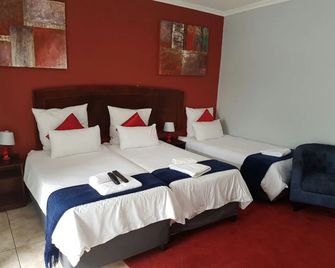 Ehrlichpark Lodge - Bloemfontein - Bedroom