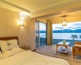 Cuihu Bay Homestay (Lugu Lake Daluoshui Wharf) - Lijiang - Bedroom