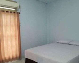 City Homestay - Sorong - Bedroom