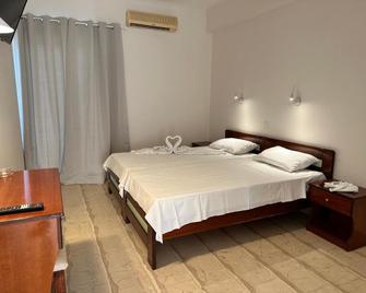 Aggelos Family Hotel - Moraitika - Bedroom