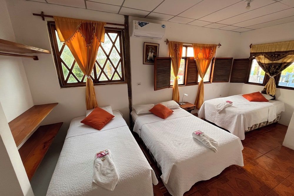 Hostal Las Gardenias - Puerto Villamil - Camera da letto