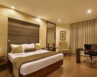 Hotel Express Residency Vadodara - Vadodara - Bedroom
