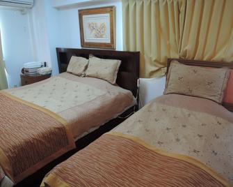 نيكو بارك لودج توبو ستيشن - نيكو - غرفة نوم