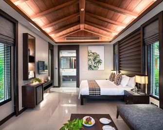 Khanom Beach Resort & Spa - Khanom - Schlafzimmer