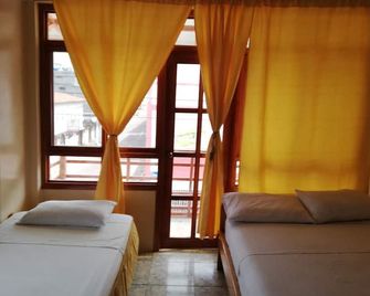 Hostal Miconia House - Puerto Ayora - Bedroom