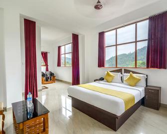 Fabhotel Abrigo Residency - Munnar - Schlafzimmer