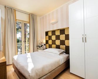 JR Resort Logos Forte dei Marmi - Forte dei Marmi - Bedroom