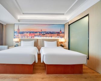 Vienna Hotel Ningbo Jiangbei Avenue Wanda Branch - Ningbo - Habitación