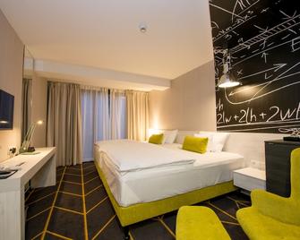 Science Hotel - Szeged - Camera da letto