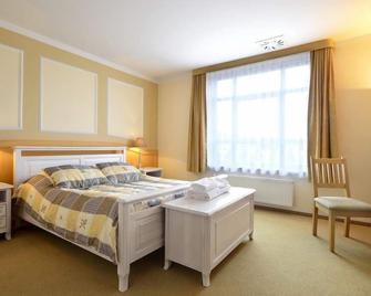 Hotel Nest - Gniezno - Schlafzimmer