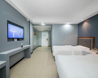 Guangzhou Junyi Apartment Hotel (Zhongcun) - Quảng Châu - Phòng ngủ