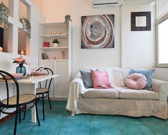 Izzhome City Love - Cagliari - Living room