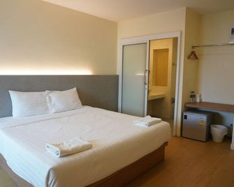 โรงแรมมาที่นี่พรีเมี่ยม - ธัญบุรี - ห้องนอน