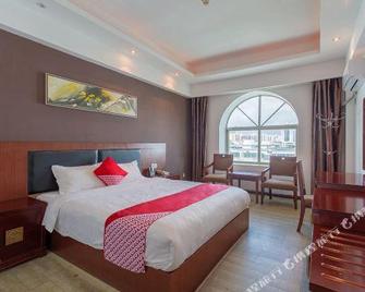 Ouya Hotel - Lingshui - Bedroom