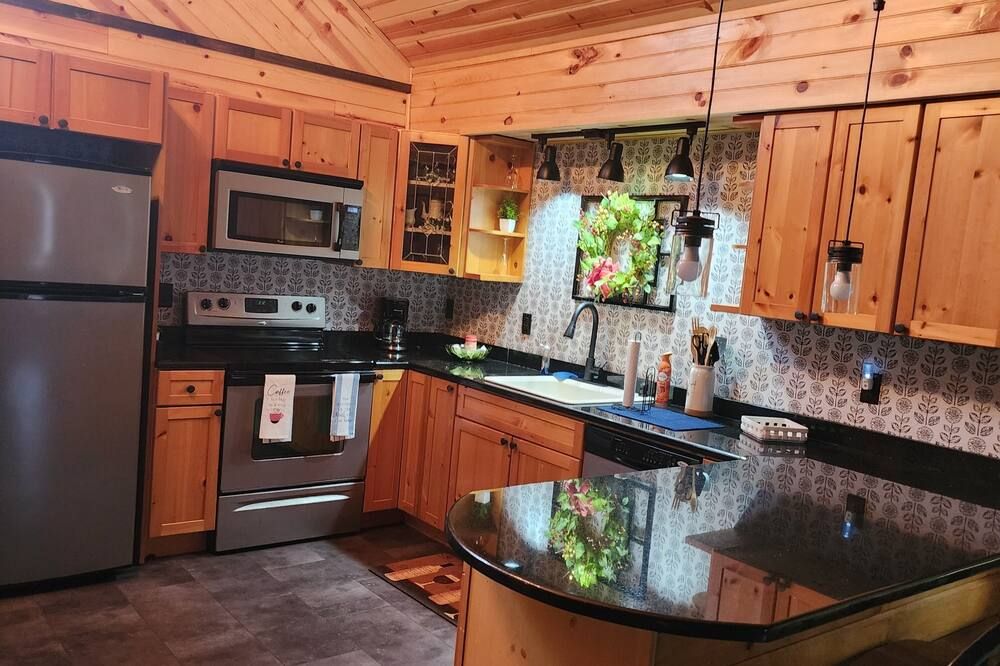 Private Home in Garrett County, surrounded by trees, fields and farmland.