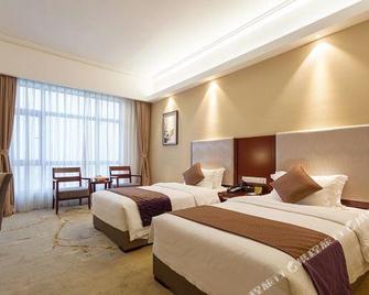 Zhangzhou Yuyuan Hotel - Zhangzhou - Спальня