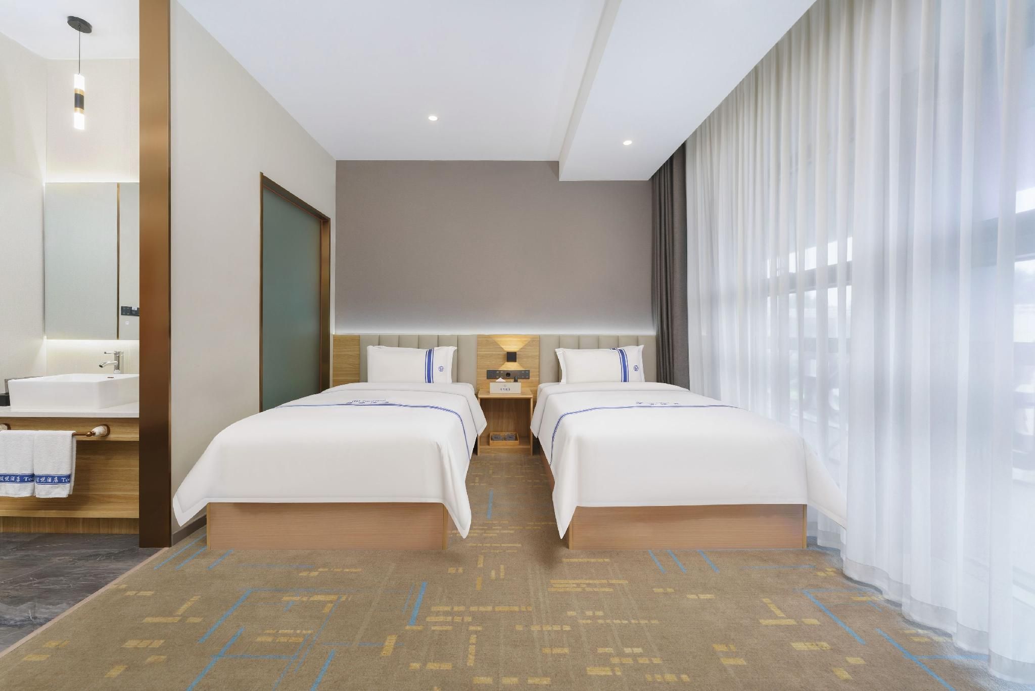 Tuyue Hotel (Dalian North Railway Station) - داليان - غرفة نوم
