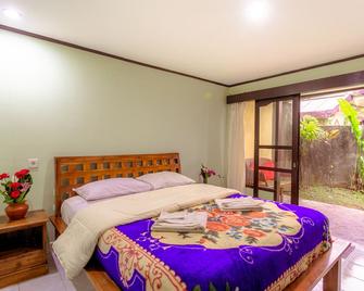 Pacung Indah Hotel & Restaurant - Baturiti - Schlafzimmer