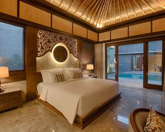 Taman Dharmawangsa Suites - Denpasar - Schlafzimmer