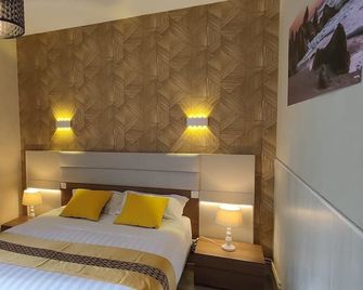 Hotel Belle Vue - סויאק - חדר שינה