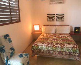 Casa de las Olas Surf & Beach Club - El Quemado - Habitación