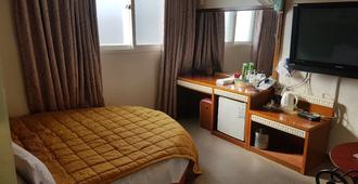 Nice Motel - Gyeongju - Makuuhuone
