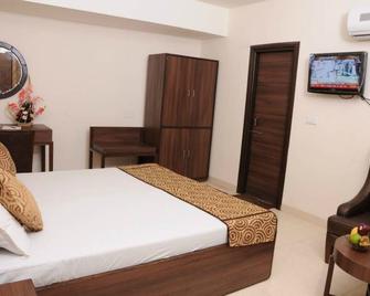 Hotel Diamond Inn - Chandigarh - Slaapkamer