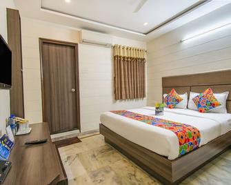 Hotel Kamran Palace - אחמדאבאד - חדר שינה