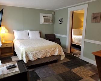 White Mountain Motel And Cottages - Lincoln - Bedroom
