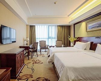 Vienna Hotel Changnan - נאנצ'אנג - חדר שינה