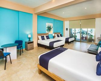 Capital O Cancun International Airport 24 7 - Cancún - Habitación