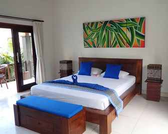 Alami Resort and Restaurant - Abang - Schlafzimmer