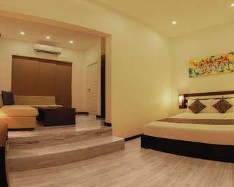 Blue Water Boutique Hotel - נגומבו - חדר שינה