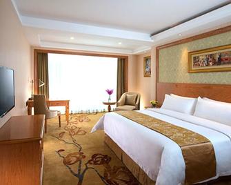 Vienna International Hotel Shenzhen Longgang Lilang - Shenzhen - Bedroom