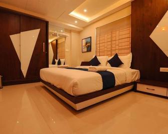 Hotel Bluebell - Кожікоде - Спальня
