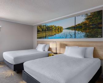 Days Inn & Suites by Wyndham Kansas City South - Kansas City - Bedroom