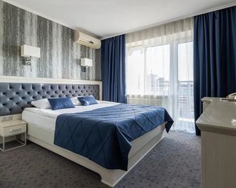 Eurohotel - לבוב - חדר שינה