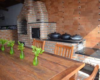 Ben Vivere Address - House For Seasonal Rentals - Contagem - Dining room