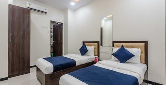 OYO 8298 Zee Residency - Mumbai - Bedroom