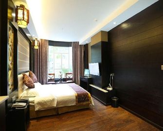 Yihao Huayuan Hotel - Chongqing - Bedroom