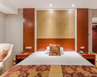 Wanyuan International Hotel - Anqing - Bedroom